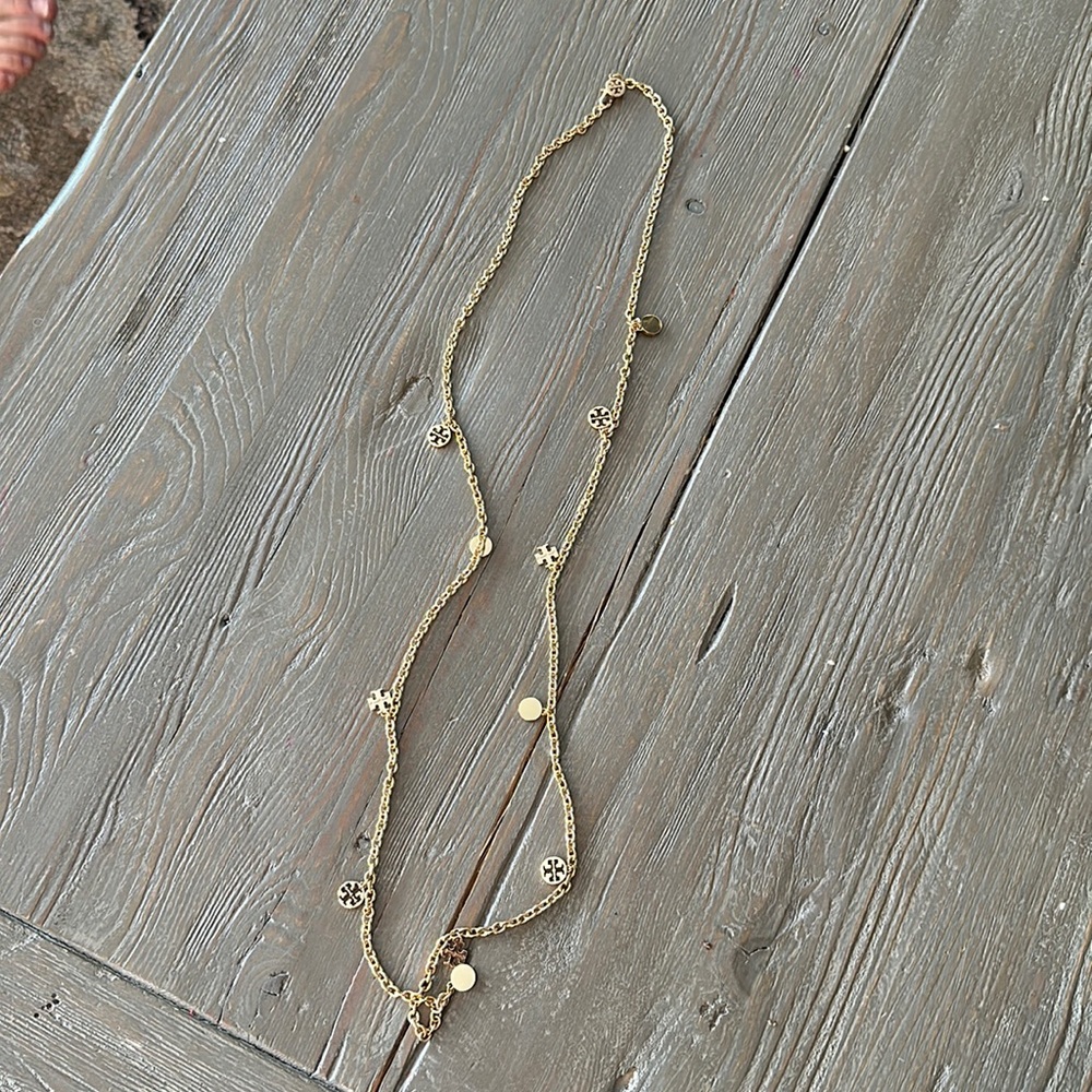 Gold long Tory Burch logo necklace